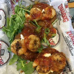 Fried green tomatoes with goat cheese and Thai chili sauce