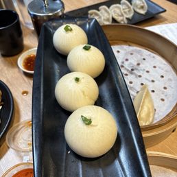 Pan Fried Pork Buns (4) 特色鲜肉煎包