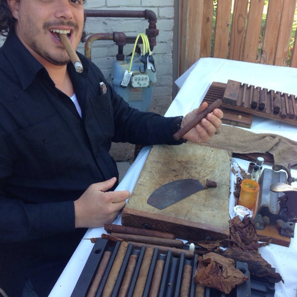 Havana's Choice Cigars - a man holding a cigar - Cigar Bars Near Me - Twinsburg, Ohio