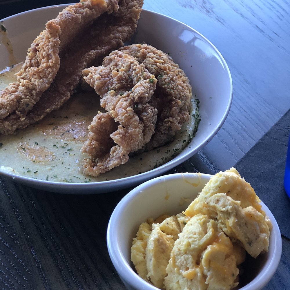 Nouveau Bar & Grill - Jonesboro - Fried catfish and grits with eggs - Bars Near Me - Jonesboro, Georgia Nouveau Bar & Grill - Jonesboro - Fried catfish and grits with eggs - Bars Near Me - Jonesboro, Georgia