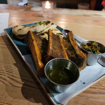 Lechon - Gaucho Bread Smoked Bone Marrow - Tapas Bars Near Me - Portland, Oregon Lechon - Gaucho Bread Smoked Bone Marrow - Tapas Bars Near Me - Portland, Oregon