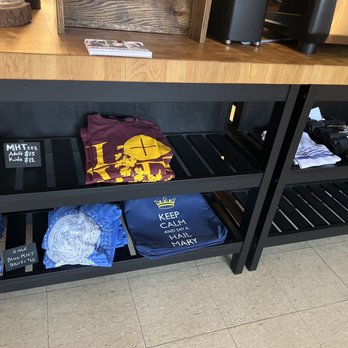 Live Oak Cafe - a display of t - shirts - Coffee & Tea Near Me - Angleton, Texas