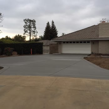 Cornerstone Construction - Concrete immediately after pour (darker than final result due to still being wet) - General Contractors Near Me - Upland, California Cornerstone Construction - Concrete immediately after pour (darker than final result due to still being wet) - General Contractors Near Me - Upland, California