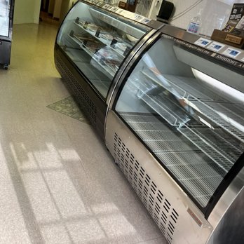 Langley Meats - a refrigerated display case - Meat Shops Near Me - Burnaby, British Columbia