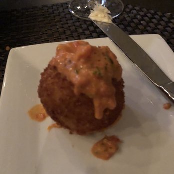Harbor House Northport - Saffron rice balls stuffed with mozzarella in vodka test - American Near Me - Northport, New York Harbor House Northport - Saffron rice balls stuffed with mozzarella in vodka test - American Near Me - Northport, New York