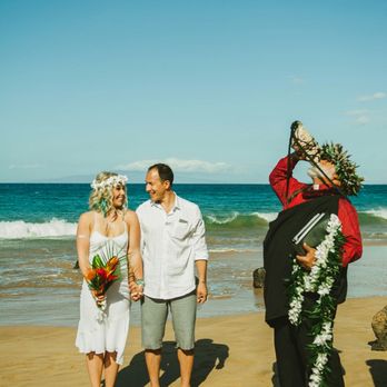 Love Maui Weddings - Pastor Laki blowing the conch shell! Best day ever! - Wedding Planning Near Me Love Maui Weddings - Pastor Laki blowing the conch shell! Best day ever! - Wedding Planning Near Me