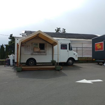 Flor de Guelaguetza - a food truck in a parking lot - Food Trucks Near Me - Portland, Oregon