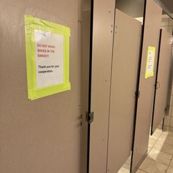 YMCA Collin County Adventure Camp - Signs in dining hall bathroom