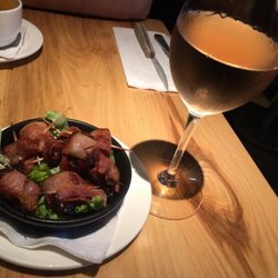 107 Fourth Avenue Wine Bar & Cafe - Bacon Wrapped dates and a glass of Malivoire Moira Rosé. Perfect