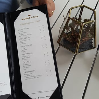Mumm Napa - The menu and table tops. - Wine Tasting Room Near Me - Rutherford, California Mumm Napa - The menu and table tops. - Wine Tasting Room Near Me - Rutherford, California