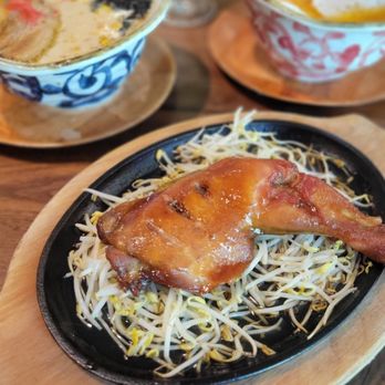 Marufuku Ramen - Sizzling Chicken Leg that comes with the chicken Paitan Ramen DX. It was nice and sweet soy flavored and could be a whole second meal! - Ramen Near Me - Austin, Texas Marufuku Ramen - Sizzling Chicken Leg that comes with the chicken Paitan Ramen DX. It was nice and sweet soy flavored and could be a whole second meal! - Ramen Near Me - Austin, Texas