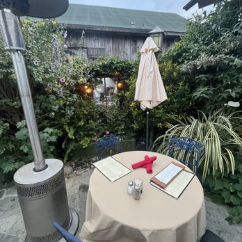 Robins Restaurant - Our table, two heat lamps were provided on both sides. - New American Near Me - Cambria, California Robins Restaurant - Our table, two heat lamps were provided on both sides. - New American Near Me - Cambria, California