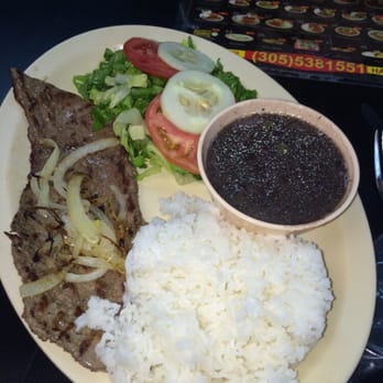 Playa Cafe - Palamillo Steak with salad, rice and beans. - Cuban Near Me - Miami Beach, Florida Playa Cafe - Palamillo Steak with salad, rice and beans. - Cuban Near Me - Miami Beach, Florida