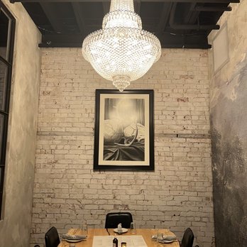 Ghostwriter Public House - a dining room with a chandelier - New American Near Me - Johnstown, Ohio Ghostwriter Public House - a dining room with a chandelier - New American Near Me - Johnstown, Ohio