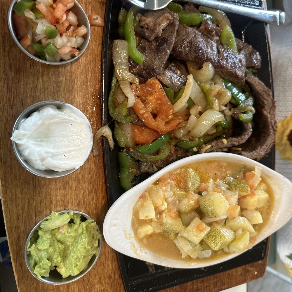 Beef plate with zucchini and condiments Beef plate with zucchini and condiments