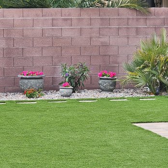 Las Vegas Backyards - Synthetic grass with inlaid stepping stones. - Landscaping Near Me - Las Vegas, Nevada