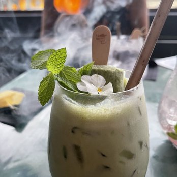 The Boardroom - Matcha Honey Cream Poptail w/ the Midnight Mescalito smoking in the back - Cocktail Bars Near Me - Kailua, Hawaii