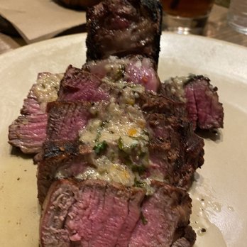 Red Ash - Thick Cut Bone-In Filet roasted shallot butter, 30-day age, Fred Linz, Chicago - Italian Near Me - Austin, Texas Red Ash - Thick Cut Bone-In Filet roasted shallot butter, 30-day age, Fred Linz, Chicago - Italian Near Me - Austin, Texas
