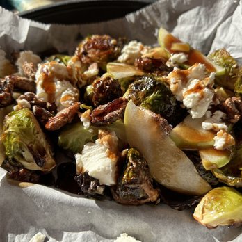 Asbury Ale House - Grilled brussels sprouts with sliced apples, walnuts, and goat cheese - Sports Bars Near Me - Asbury Park, New Jersey Asbury Ale House - Grilled brussels sprouts with sliced apples, walnuts, and goat cheese - Sports Bars Near Me - Asbury Park, New Jersey