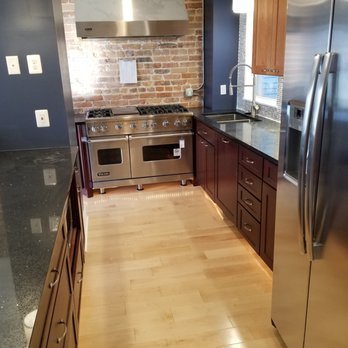 B H I Construction - a kitchen with stainless steel appliances - General Contractors Near Me - Beltsville, Maryland B H I Construction - a kitchen with stainless steel appliances - General Contractors Near Me - Beltsville, Maryland