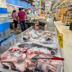 Hong Kong Supermarket - Inside the seafood section. Various fish parts including heads.