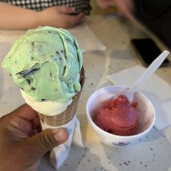 Scherb's Ice Cream - Double scoop of ice cream one white pistachio one mint and chip on a waffle cone