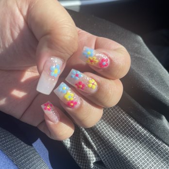 Pro Nails & Spa - Glitter acrylic powder with colorful daisies! - Nail Salons Near Me - Costa Mesa, California Pro Nails & Spa - Glitter acrylic powder with colorful daisies! - Nail Salons Near Me - Costa Mesa, California