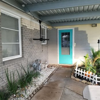 Houston Brick Stain - Half finished paint job, used brush on the siding - Painters Near Me