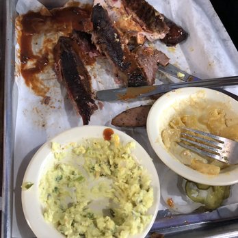 Ray's Real Pit BBQ Shack - Halfway through our 4 meat platter. Forgot to take pics before we ate because we were too excited. My bad! Excuse the ugly pic!! - Barbeque Near Me - Houston, Texas