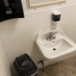 Golden Dragon - The Golden Dragon's sink and small trash can.