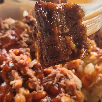 Jambo's BBQ Shack & Catering - a fork lifting up a bite of jambob - Barbeque Near Me - Rendon, Texas