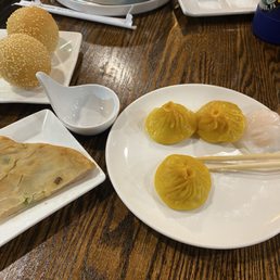 Har gow, scallion pancake, red bean bun, Steamed Chicken Soup Dumpling (5) Har gow, scallion pancake, red bean bun, Steamed Chicken Soup Dumpling (5)