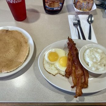 Barry's Cafe - Firehouse breakfast with Sunnyside up eggs, plain pancake, bacon, and grits. - Burgers Near Me - Raleigh, North Carolina Barry's Cafe - Firehouse breakfast with Sunnyside up eggs, plain pancake, bacon, and grits. - Burgers Near Me - Raleigh, North Carolina