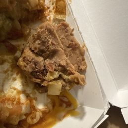 clumps of beans on the mexican pizza