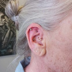 Lovegood Tattoos & Body Piercings - Helix, Rook, Daith, Conch and lobe piercings