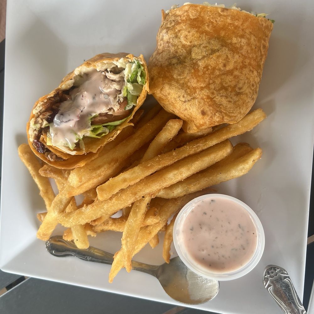 Olympic Taverna - Chicken pecan salad wrap with a side of fries - Greek Near Me - Palm City, Florida Olympic Taverna - Chicken pecan salad wrap with a side of fries - Greek Near Me - Palm City, Florida