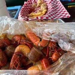 Lousiana Crab Shack - Snow crabs, shrimp, crawfish and sausage. My son chicken tenders are gone but in the picture as well