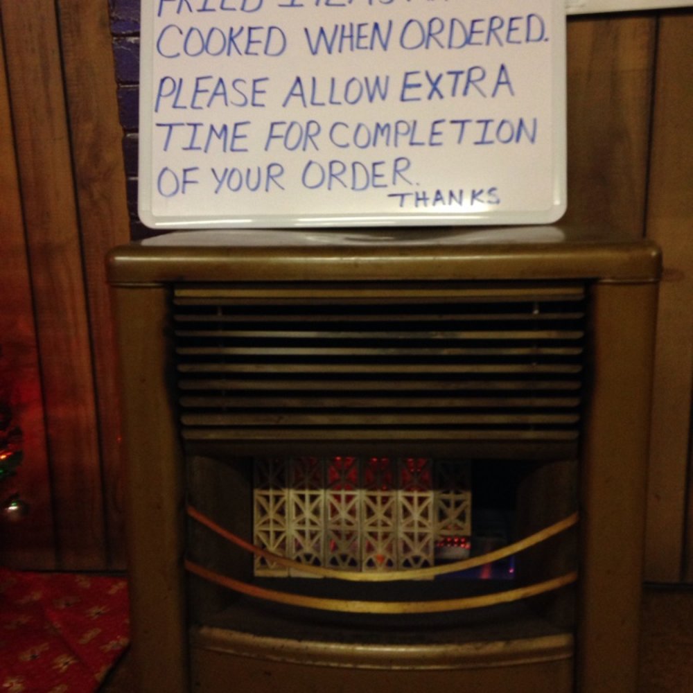 Martin's Place - a sign on a stove - Barbeque Near Me - Bryan, Texas Martin's Place - a sign on a stove - Barbeque Near Me - Bryan, Texas