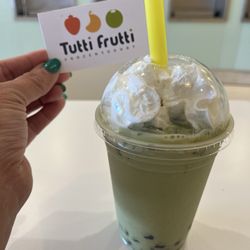 Tutti Frutti Frozen Yogurt - This a matcha drink blended with boba topped whip cream.