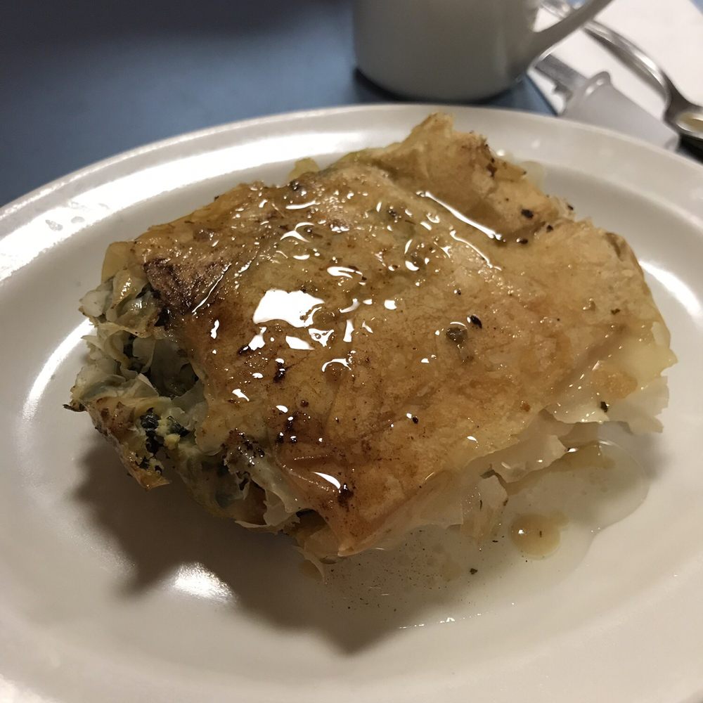 Seneca Towne Restaurant - Spanakopita with Greek dressing (we put the Greek dressing on) - Greek Near Me - Buffalo, New York Seneca Towne Restaurant - Spanakopita with Greek dressing (we put the Greek dressing on) - Greek Near Me - Buffalo, New York
