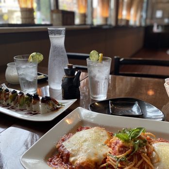 Raiz Kitchen Sushi Bar - a plate of spaghetti and a glass of water - Sushi Bars Near Me - Chicago, Illinois