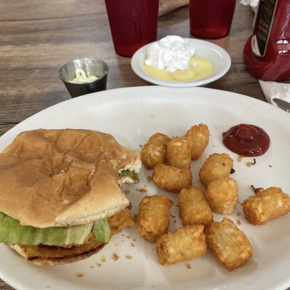 Chicken sandwich and taters