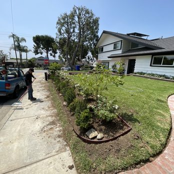 A R Gardening Services - a man standing in front of a house - Lawn Services Near Me A R Gardening Services - a man standing in front of a house - Lawn Services Near Me