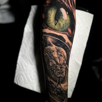Achilles Art Studio - Snake and eye realism tattoo (both black and grey and color) - Tattoo Near Me - Rockville, Maryland