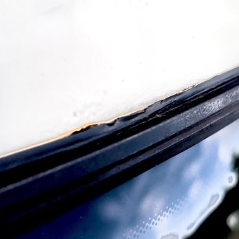 Safelite AutoGlass - Damage to trim done by Safelite tech, during inspection, with tech's red pry tool. No longer water tight! - Windshield Installation & Repair Near Me - Sanford, Florida