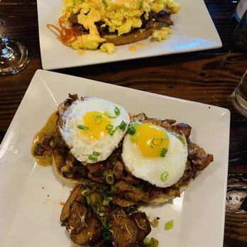 Outpost 45 - Hot Fried Chicken Bennie (bottom) and Smoked Brisket Bennie (top, scrambled eggs added) - Breakfast & Brunch Near Me - New Orleans, Louisiana