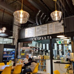 a man sitting at a table in a restaurant
