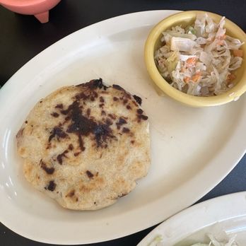 Taquitos Penjamo - Pupusas with curtido. (Pickled cabbage) - Mexican Near Me - Houston, Texas Taquitos Penjamo - Pupusas with curtido. (Pickled cabbage) - Mexican Near Me - Houston, Texas
