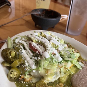 Manrique's Mexican Restaurant - Green sauce enchiladas, beans, rice. Notice salsa is gone and margarita is half full! YUMMO! - Mexican Near Me - Clayton, Georgia