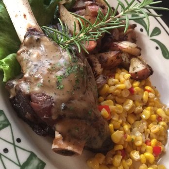 1424 Bistro - Roasted lamb shank with Greek potatoes and sauté corn $18 - Seafood Near Me - Waco, Texas